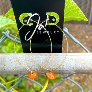 Gold plated hoop earrings with drop wire wrapped stone